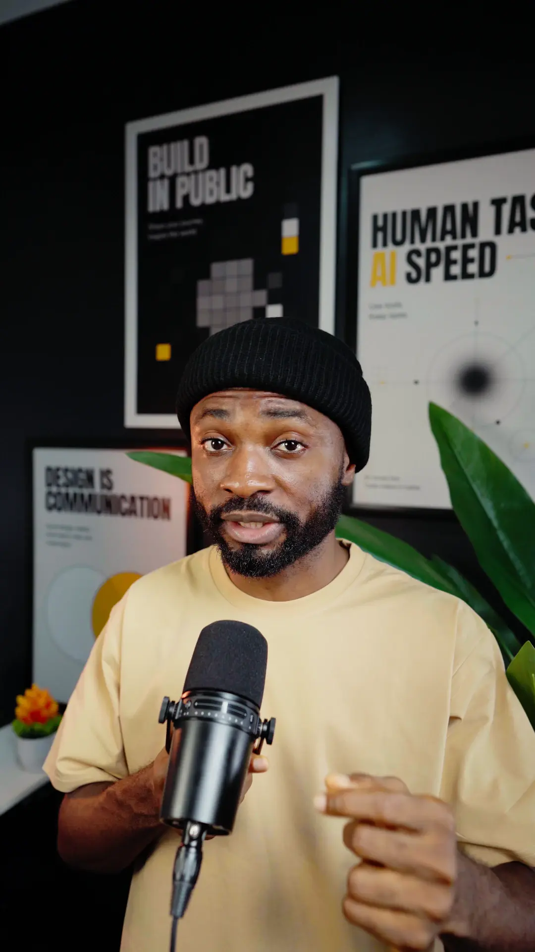 Hyginus speaking into a microphone for a video about five tech skills to learn in 2026